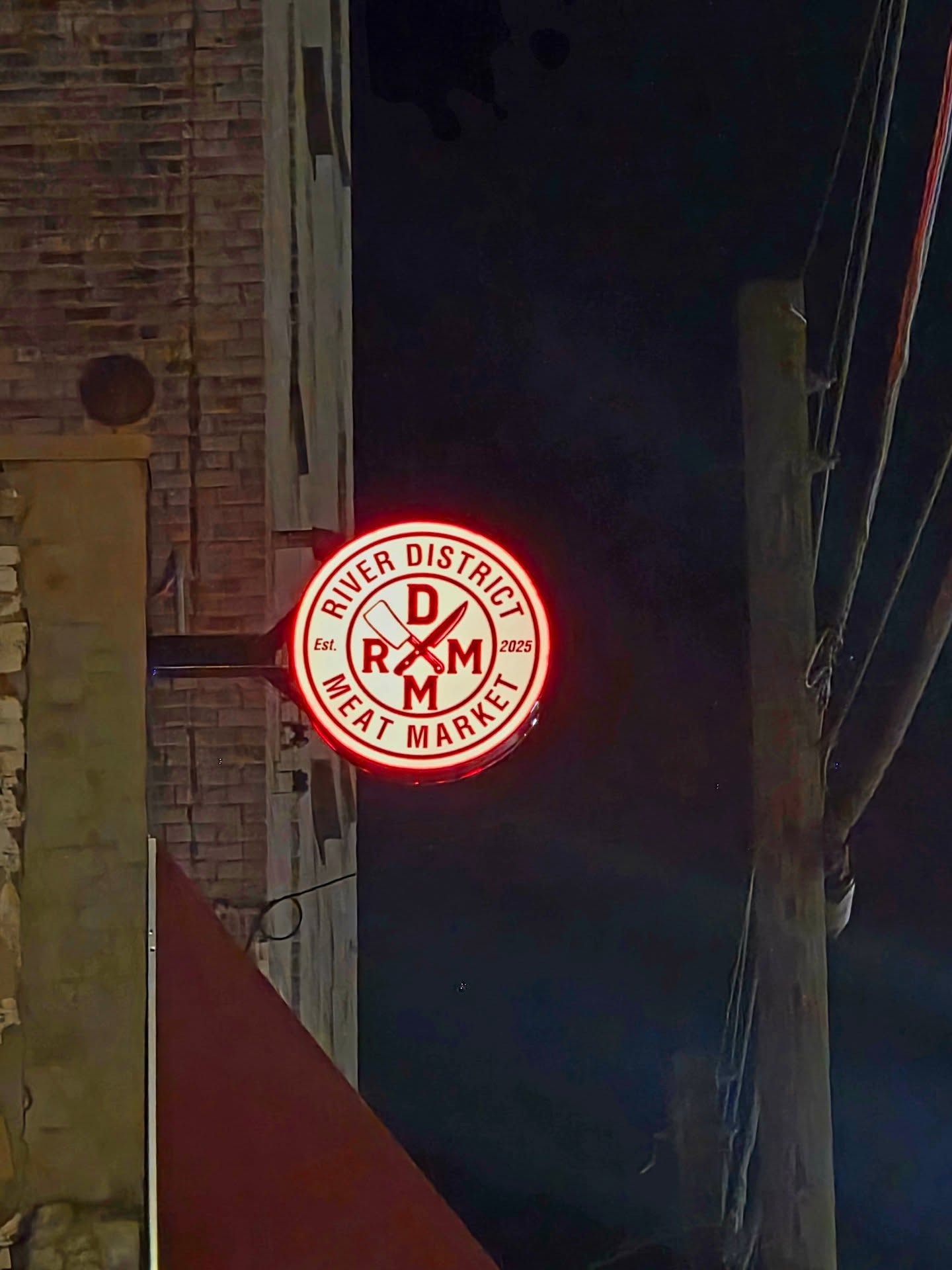 Illuminated sign at night